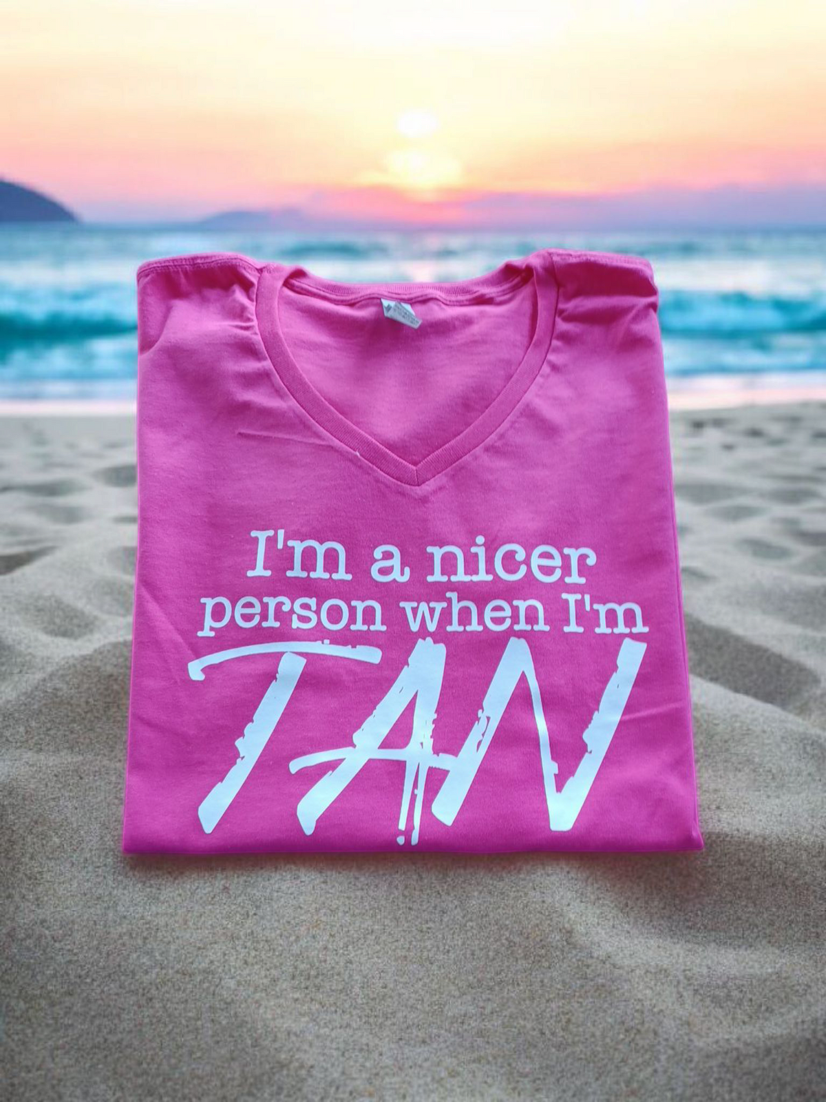 V-neck T Shirt with "I'm A Nicer Person When I'm Tan" text, short sleeve and 100% cotton for summer comfort