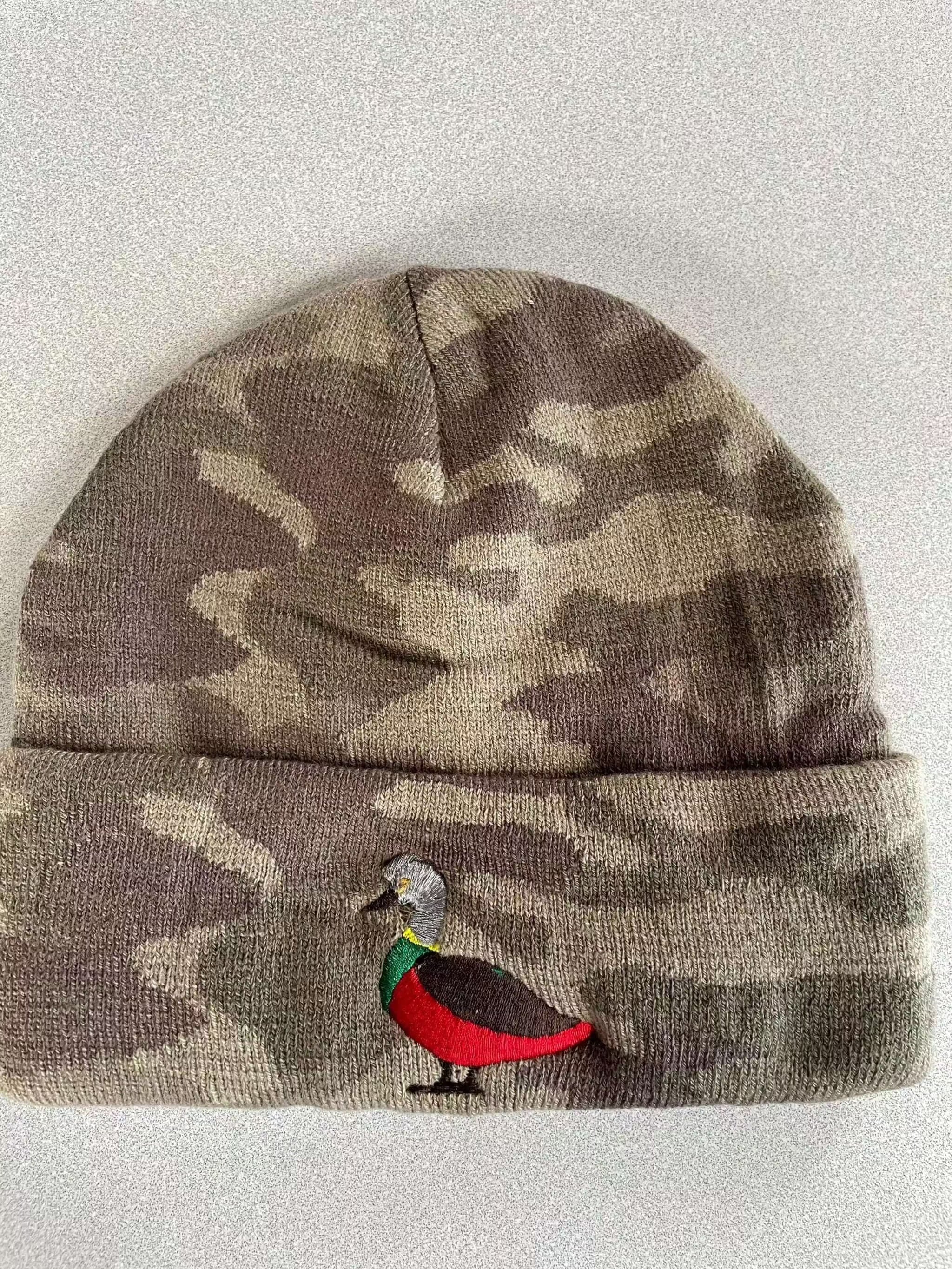 Camouflage warm knit hat with embroidered colorful bird logo and cuffed design