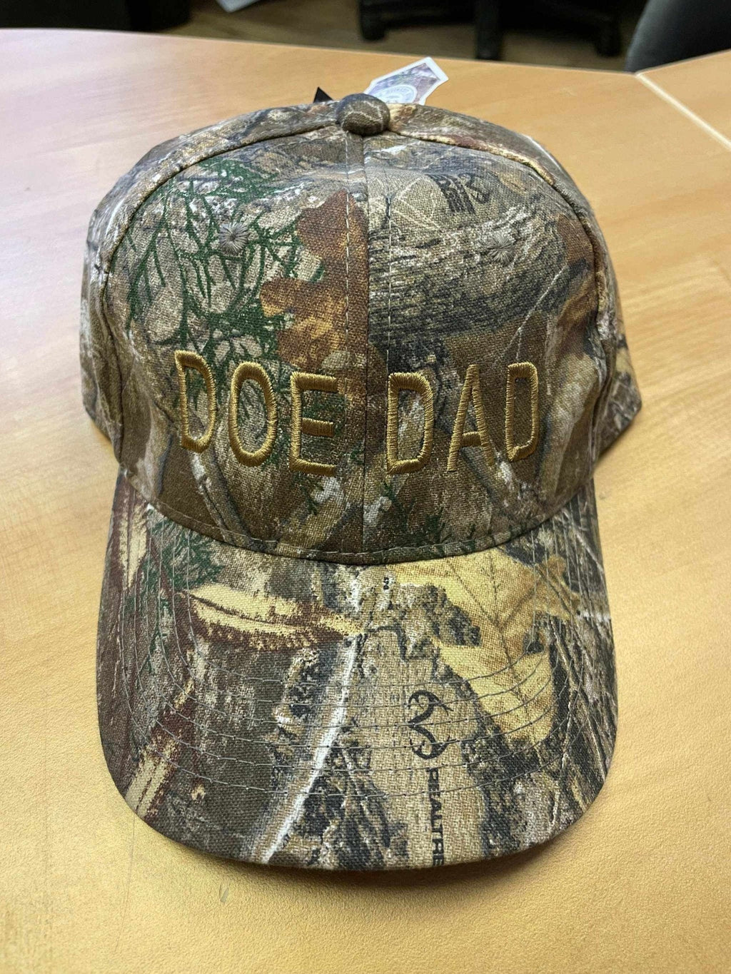 Doe Dad camo baseball hat with adjustable strap and cotton brushed fabric