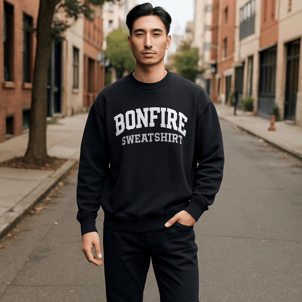 Man wearing black Bonfire Crewneck sweatshirt standing on street