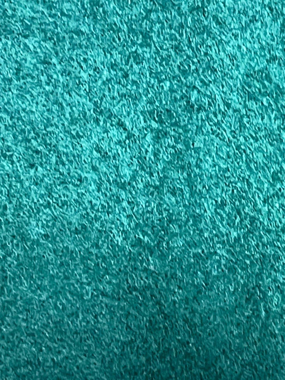 Close-up of soft teal fleece fabric for fleece neck warmer designed for asthma-friendly warmth and comfort