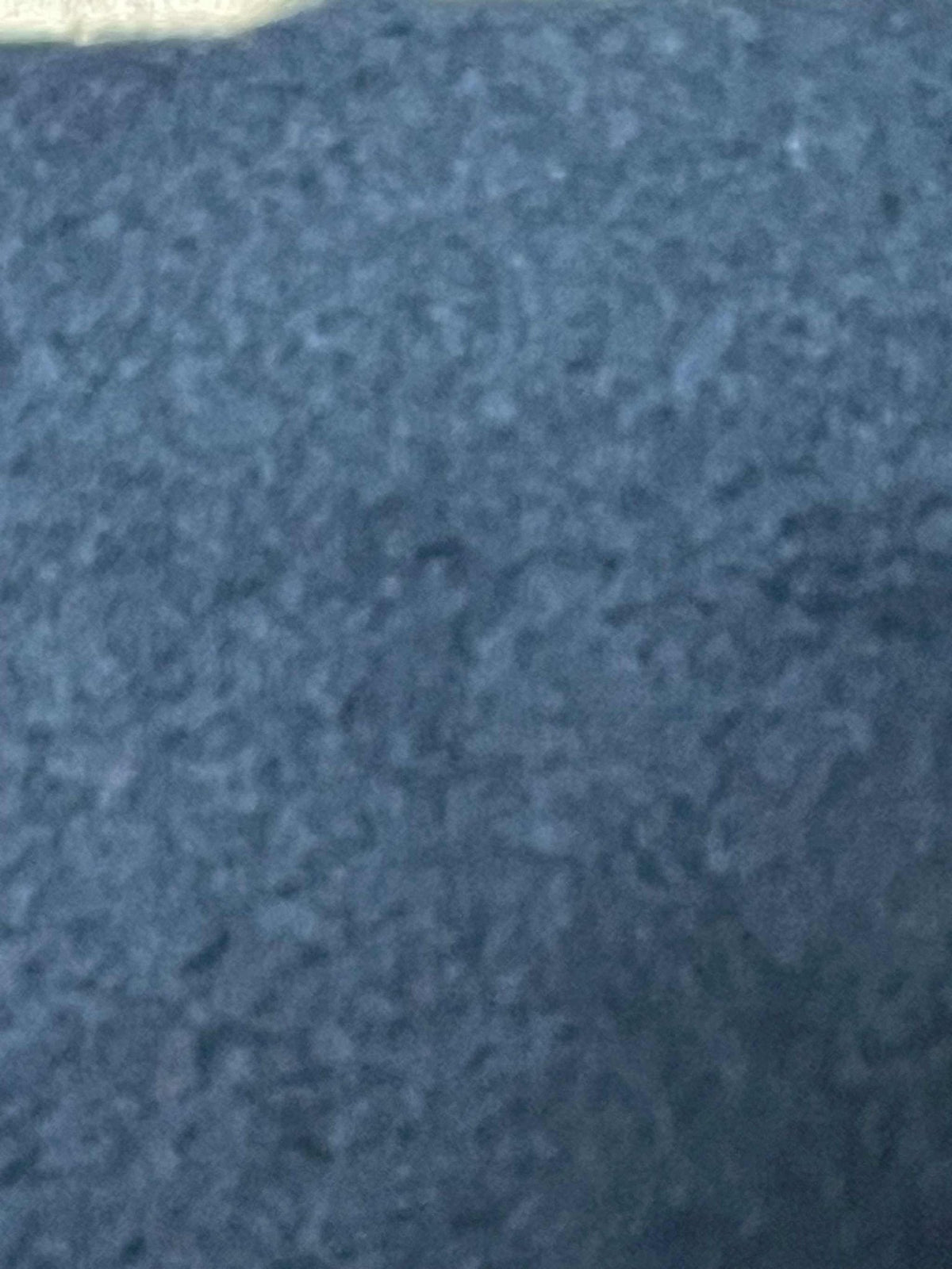 Close-up of soft blue fleece neck warmer fabric for warmth and comfort