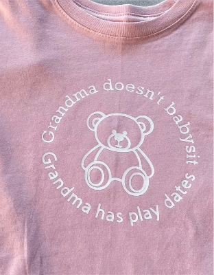 Toddler pink tee shirt with grandma play dates teddy bear graphic
