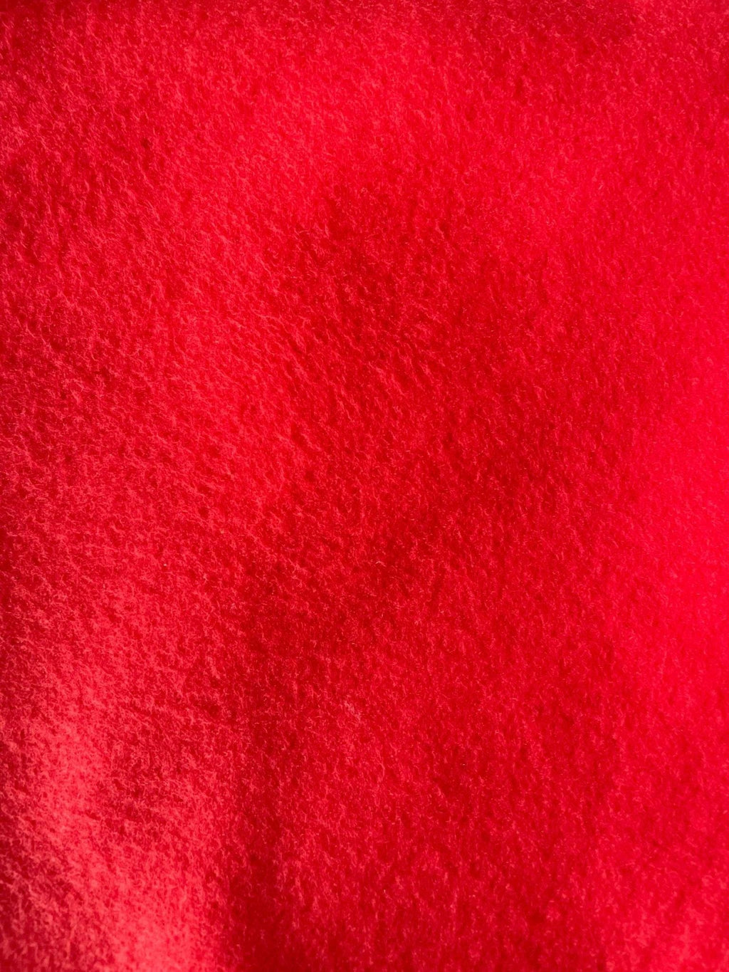 Red fleece close-up fabric texture for Varsity Fleece Neck Warmer