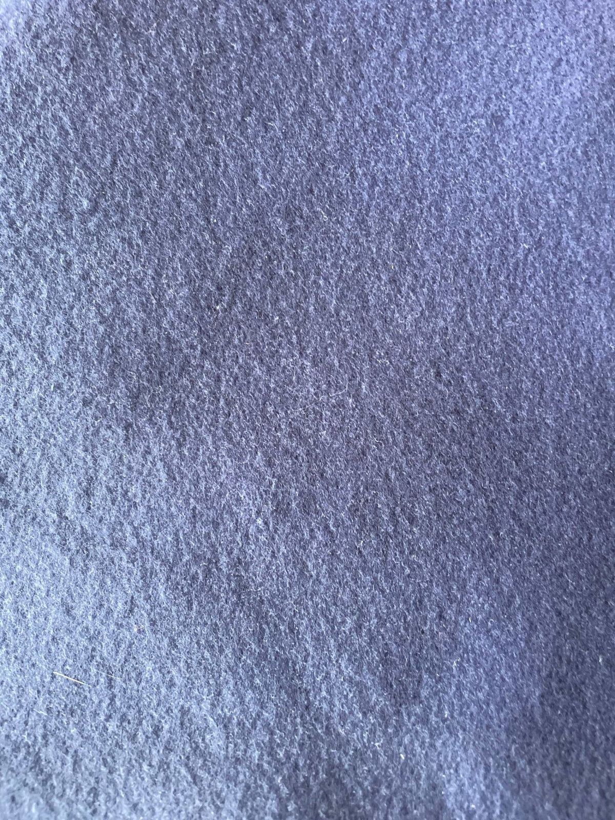 Close-up of soft royal blue Varsity Fleece Neck Warmer fabric texture